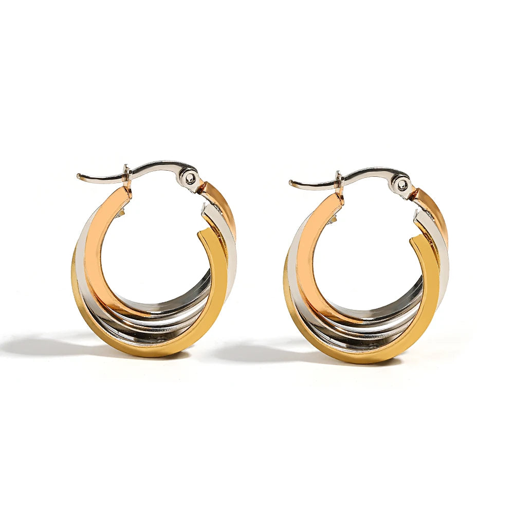 Pair of two-tone gold and silver layered hoop earrings