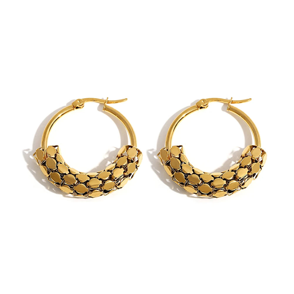 Gold-tone hoop earrings with smooth upper arcs and textured lower fronts