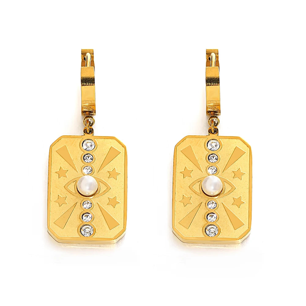 Gold-tone plaque drop earrings with pearl, crystal, and star details