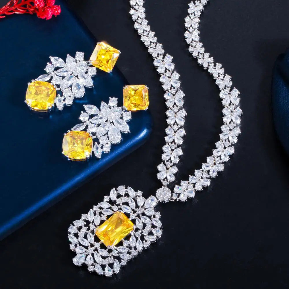 Cubic zirconia necklace and earring set with yellow center stones and clear surrounding crystals