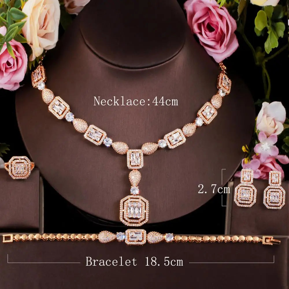 Gold-tone zirconia necklace set with bracelet and square earrings, styled on a bust