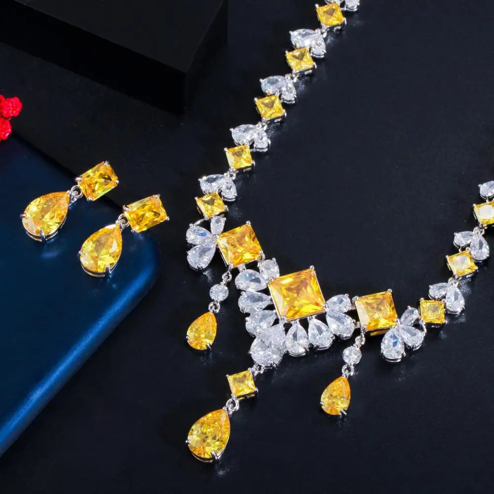 Close-up of the set's square yellow stones and dangling teardrop accents