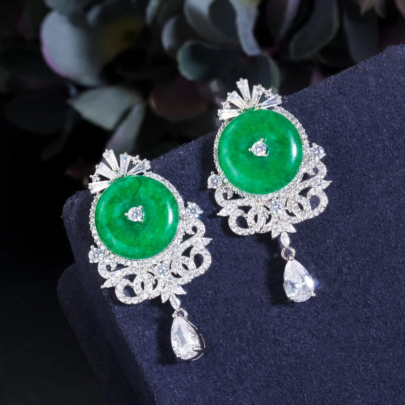Green jade cabochon pendant necklace with matching drop earrings, silver-tone zircon details