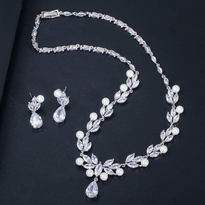 Necklace and stud-style earrings set with pearly beads and cubic zirconia leaf teardrops