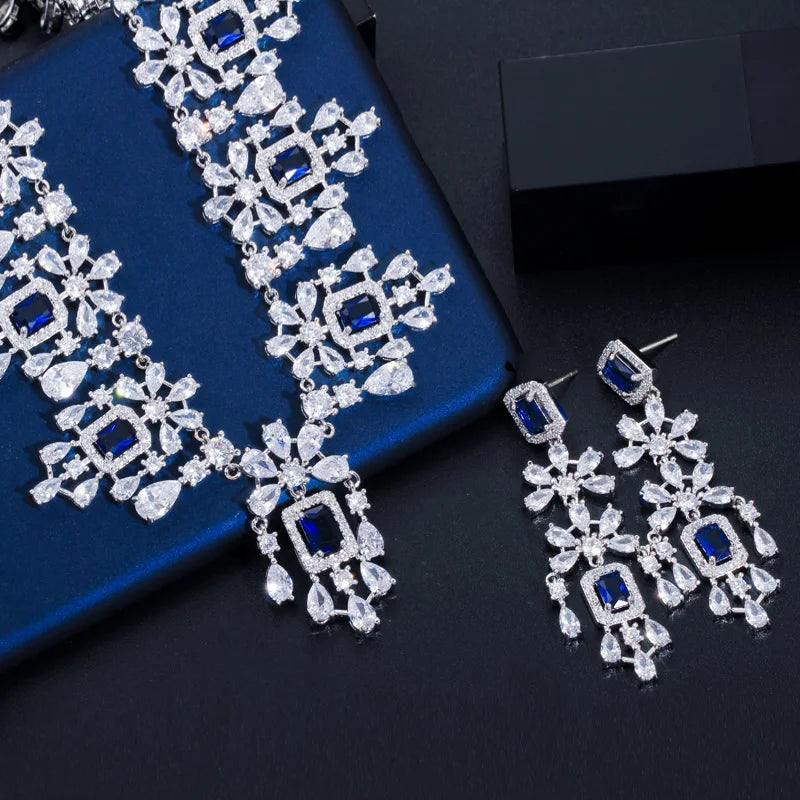 Cubic zirconia necklace with blue square accents and matching drop earrings