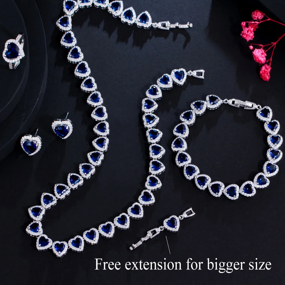 Blue heart cubic zirconia bridal jewelry set with necklace, bracelet, earrings, and ring