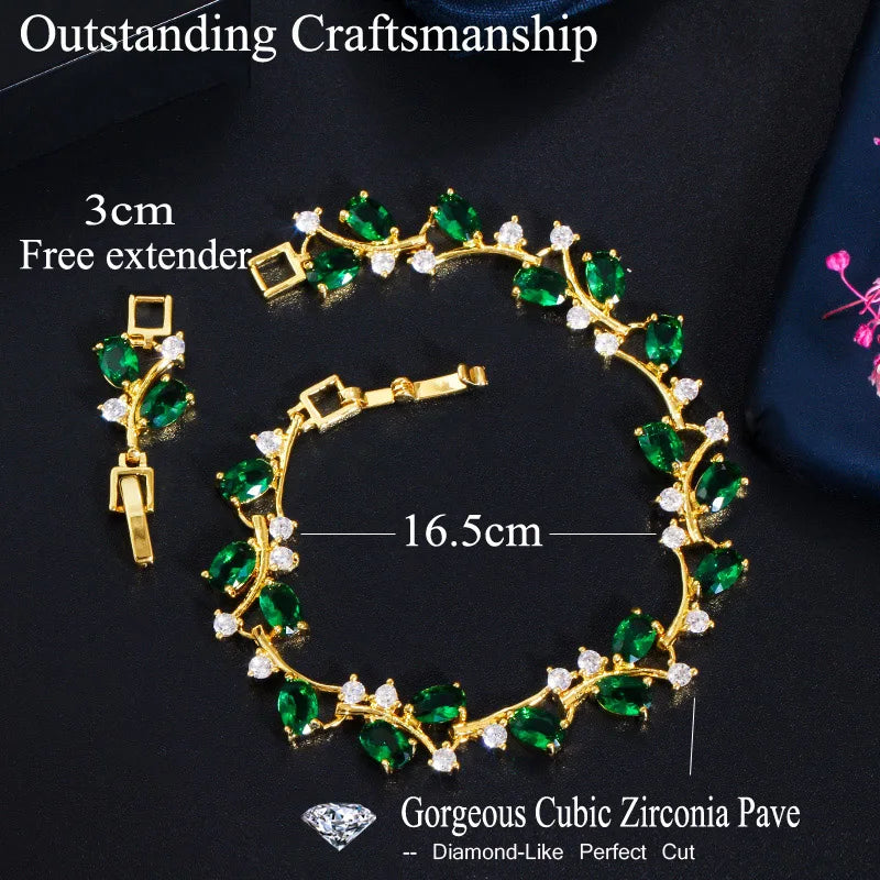Gold-tone green and clear cubic zirconia bracelet with a 3 cm extender