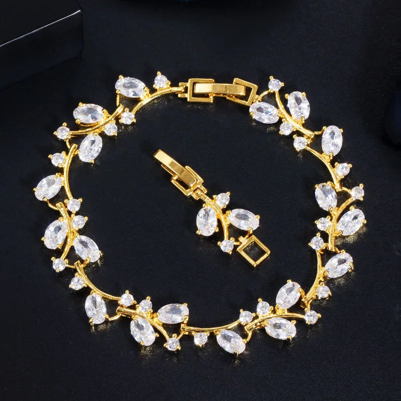 Gold-tone leaf branch bracelet with clear cubic zirconia stones