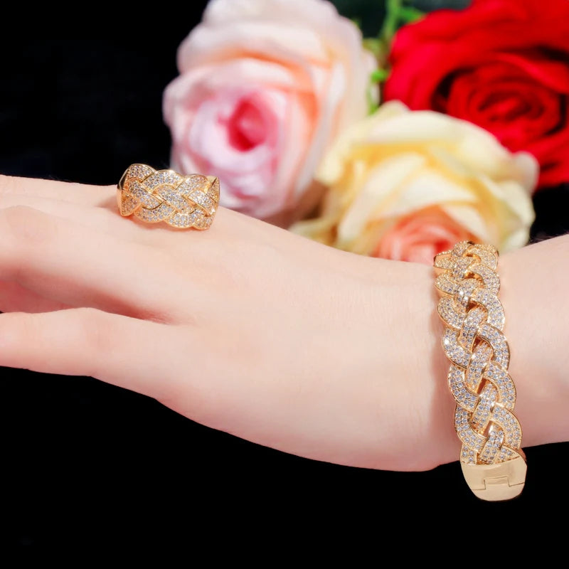 Rose gold CZ bangle bracelet worn with matching link ring on hand