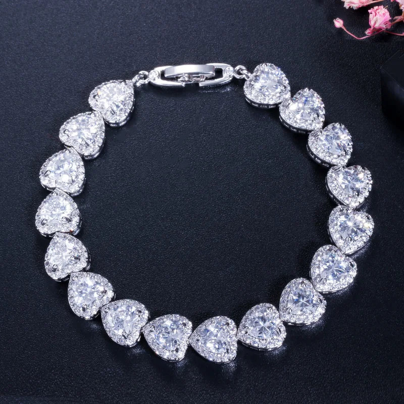 Silver-tone bracelet with a row of clear heart-shaped crystals