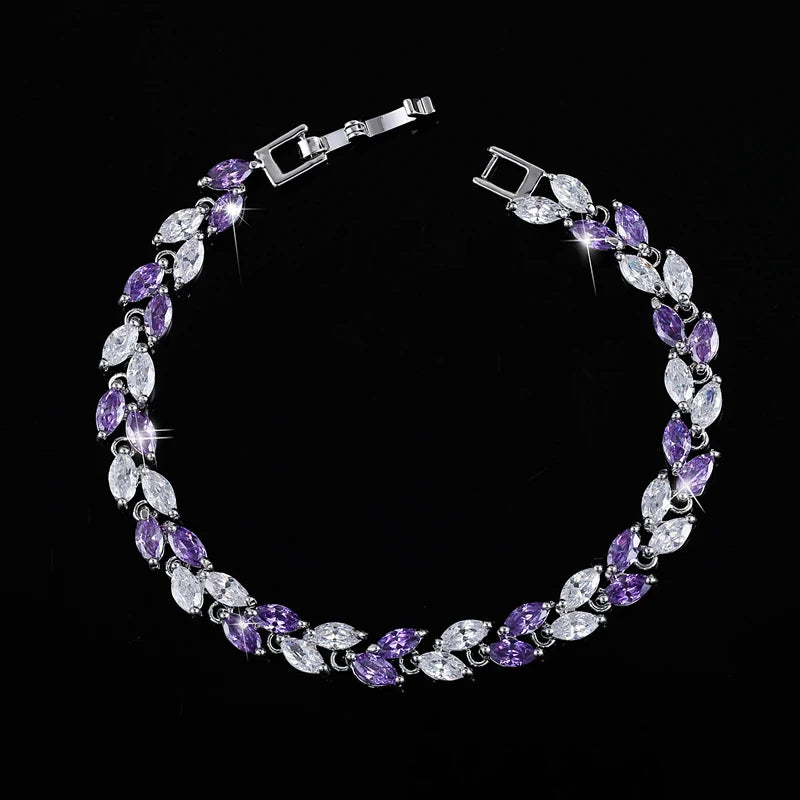 Silver-tone bracelet with alternating purple and clear marquise-cut stones