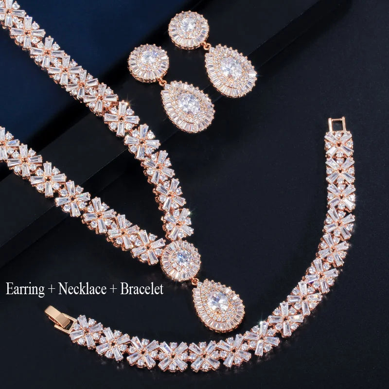 Rose gold-tone cubic zirconia necklace, bracelet, and earrings with oval and baguette details