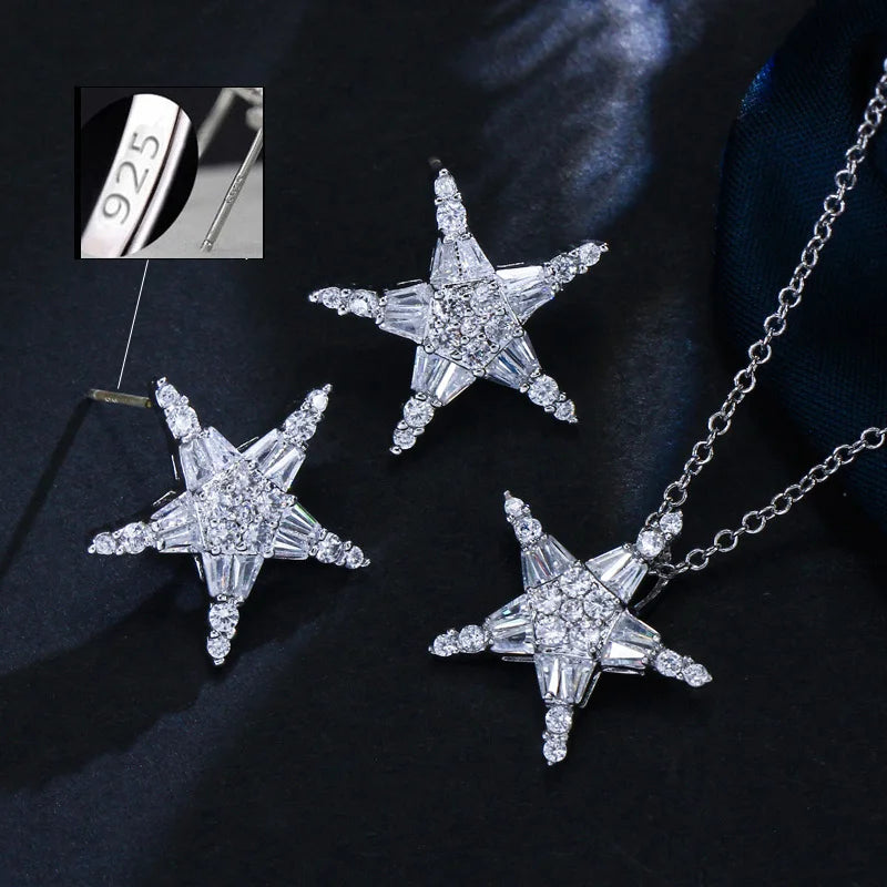 Cubic zirconia star earrings and matching pendant on a silver-tone chain