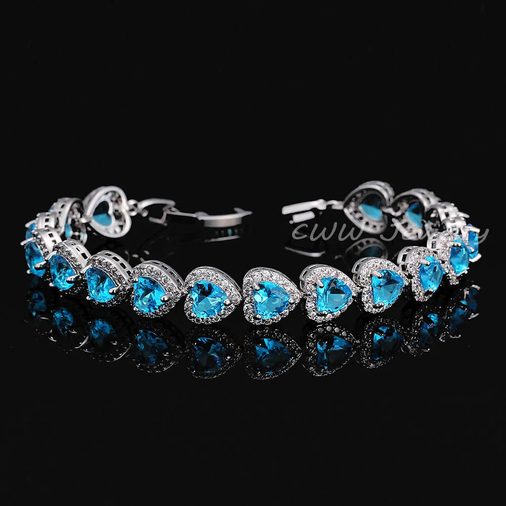 Crystal bracelet with blue heart-shaped stones in silver-tone settings