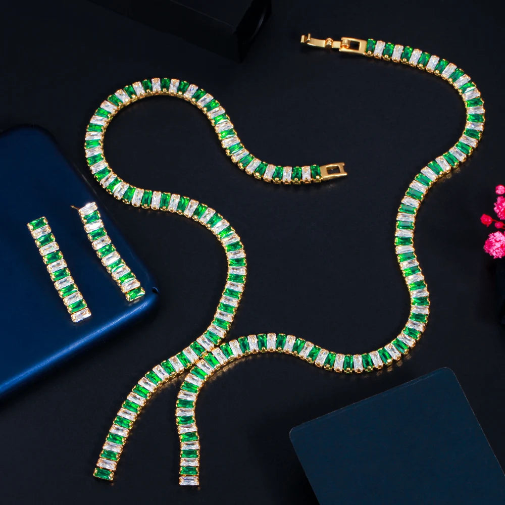 Green baguette zircon necklace with matching drop earrings and gold-tone settings