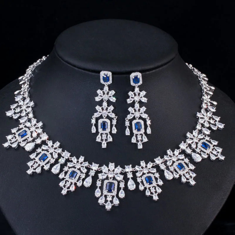 Blue-stone cubic zirconia necklace with matching drop earrings, silver-toned frame