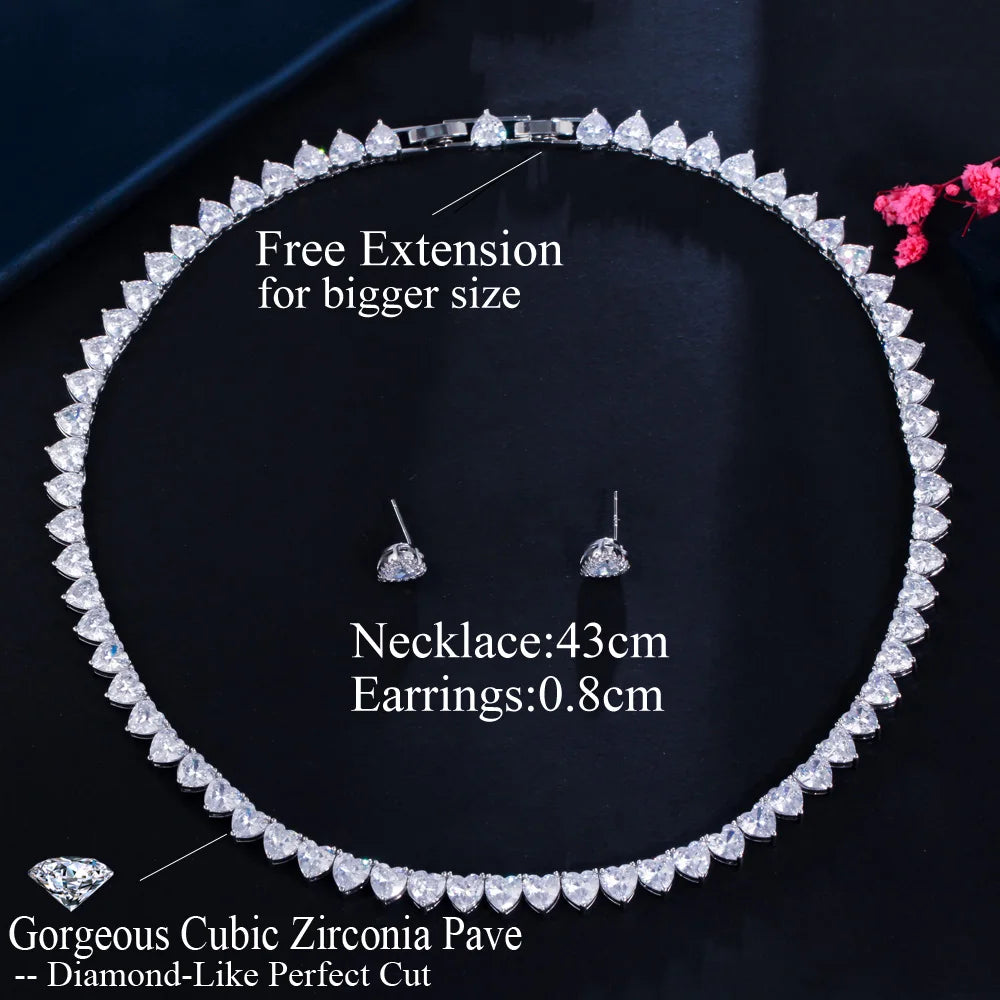 Sparkling cubic zirconia heart choker necklace with matching heart stud earrings, silver.