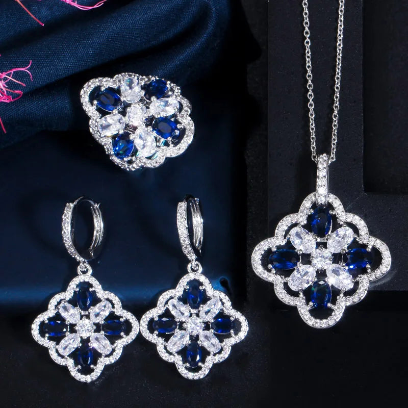 Silver-tone floral zircon jewelry set with dark blue stones and clear accents