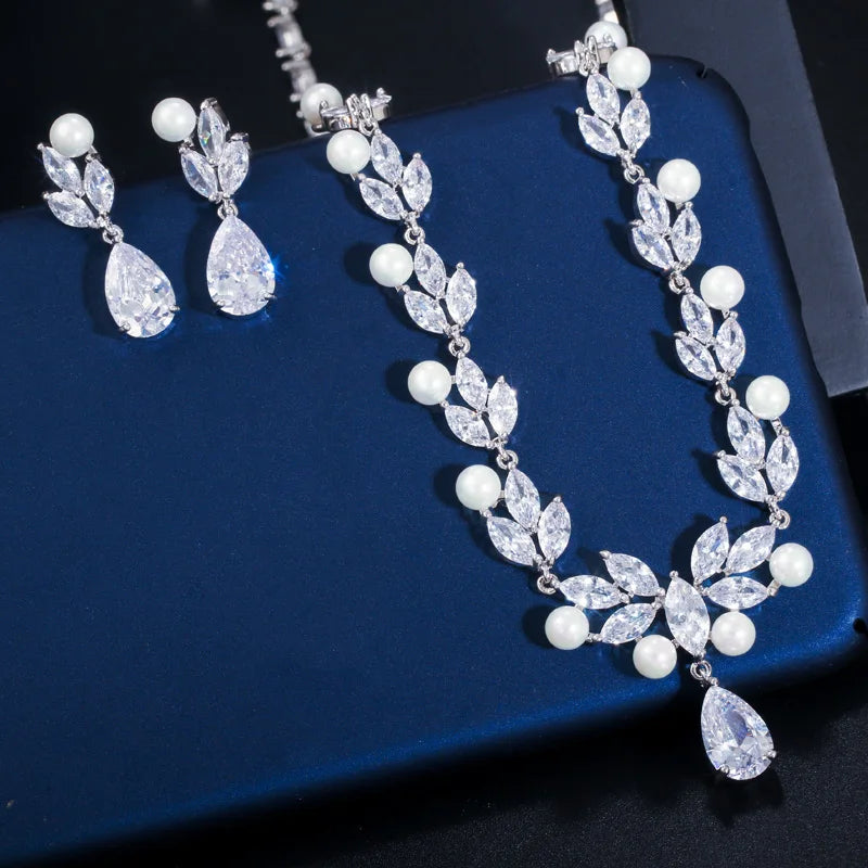 Cubic zirconia leaf drop necklace with pearl bead strands and matching dangling earrings