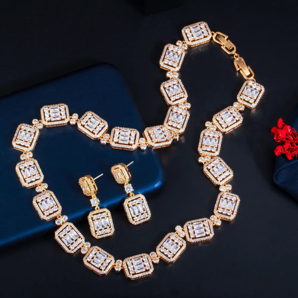 Gold-tone geometric cubic zirconia necklace and drop earring set