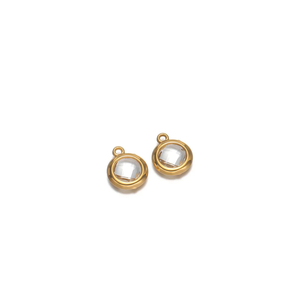 Clear round faceted glass charm pendants with gold-tone loops, pair view