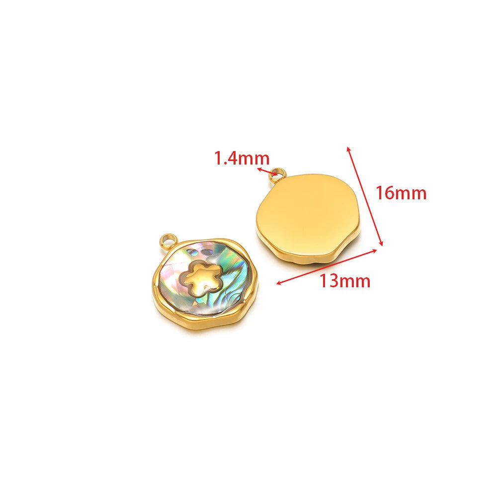 Gold-tone round shell charm pendant with bail; iridescent star detail charm beside it.