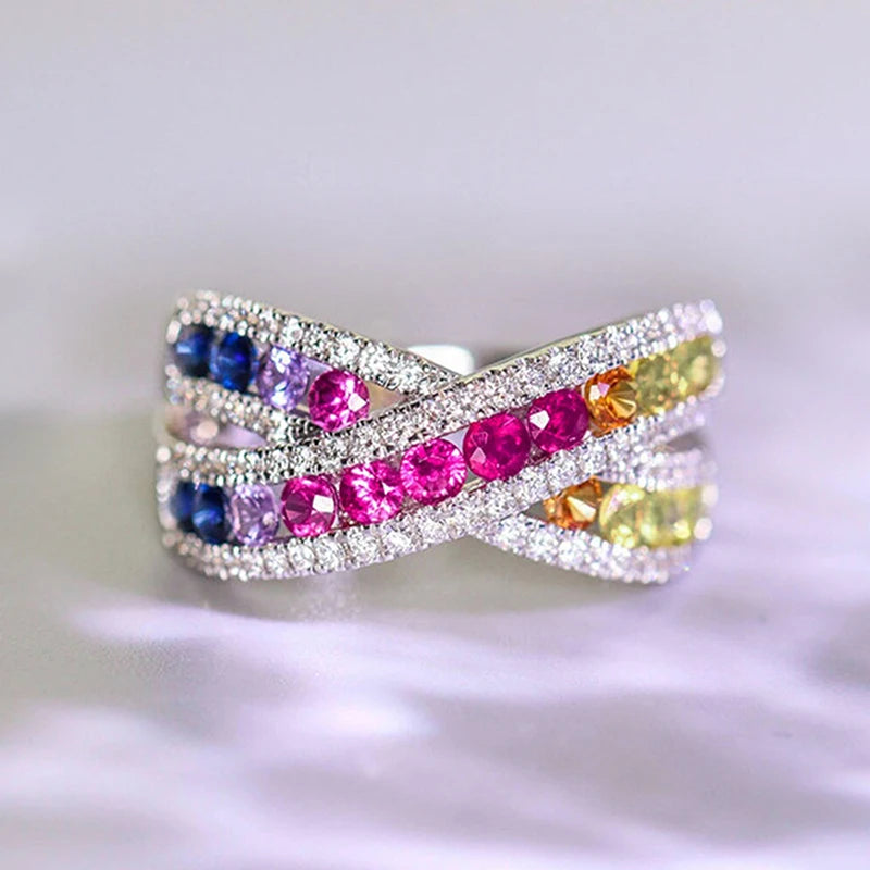 Rainbow CZ cross ring with multicolor stones and pavé bands
