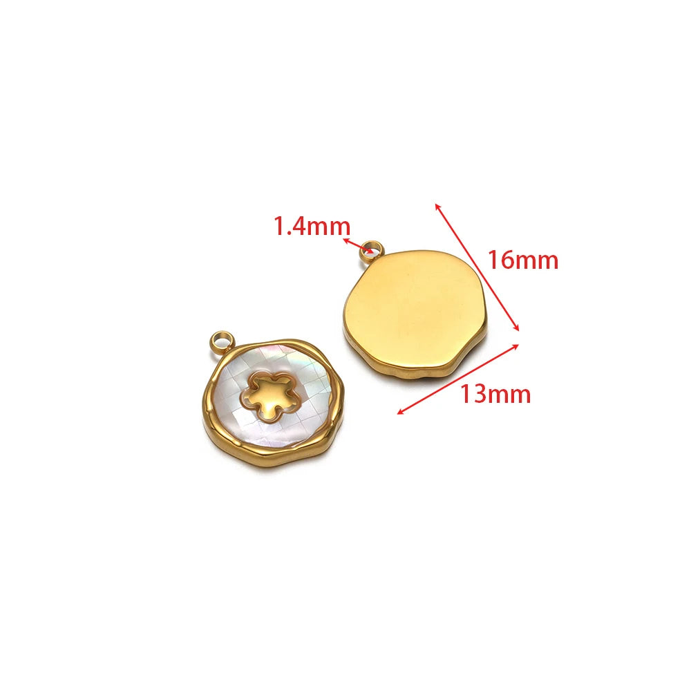 Gold-tone round shell charm pendant with bail; iridescent inner star charm beside it.
