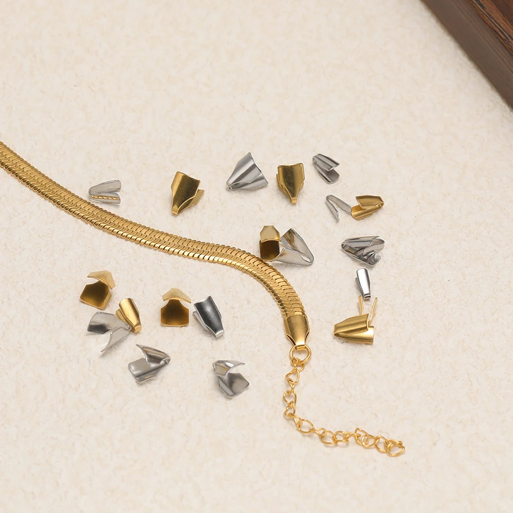 Gold snake chain with gold and silver crimp end caps for cord tips