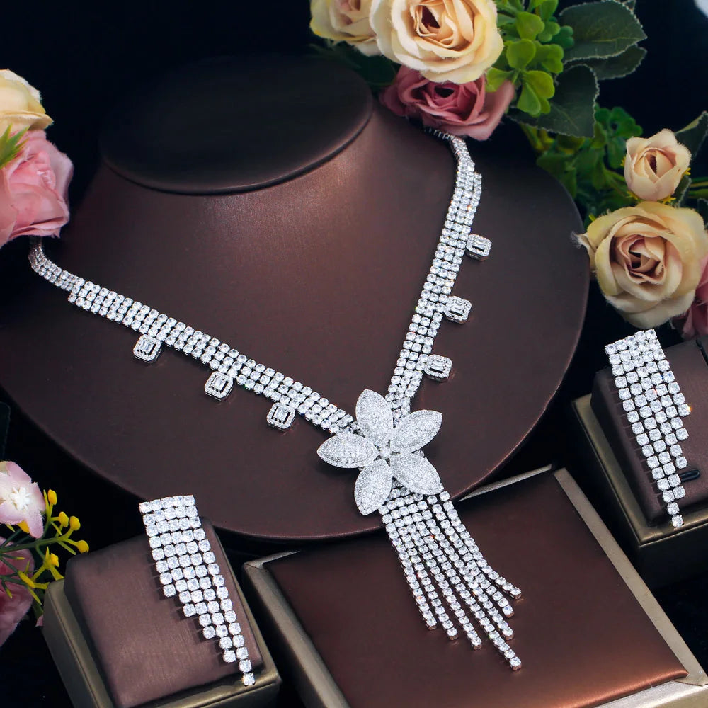 Sparkling crystal bridal necklace set with flower center tassel drop and matching earrings