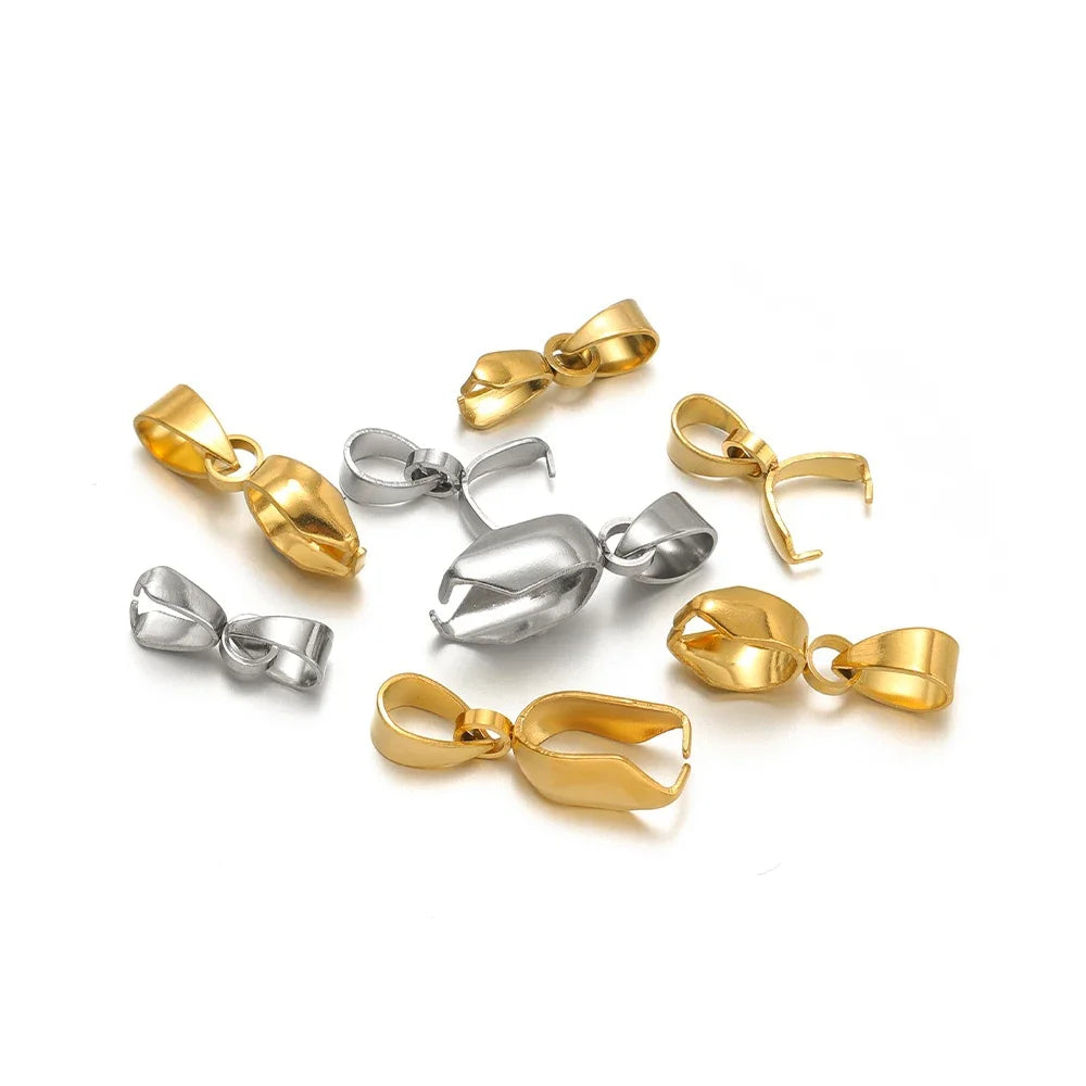 Assorted gold and silver pinch bail connectors with loop hooks, small metal clasps