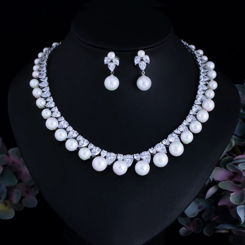 Pearl rhinestone jewelry set: layered choker necklace and drop earrings on display