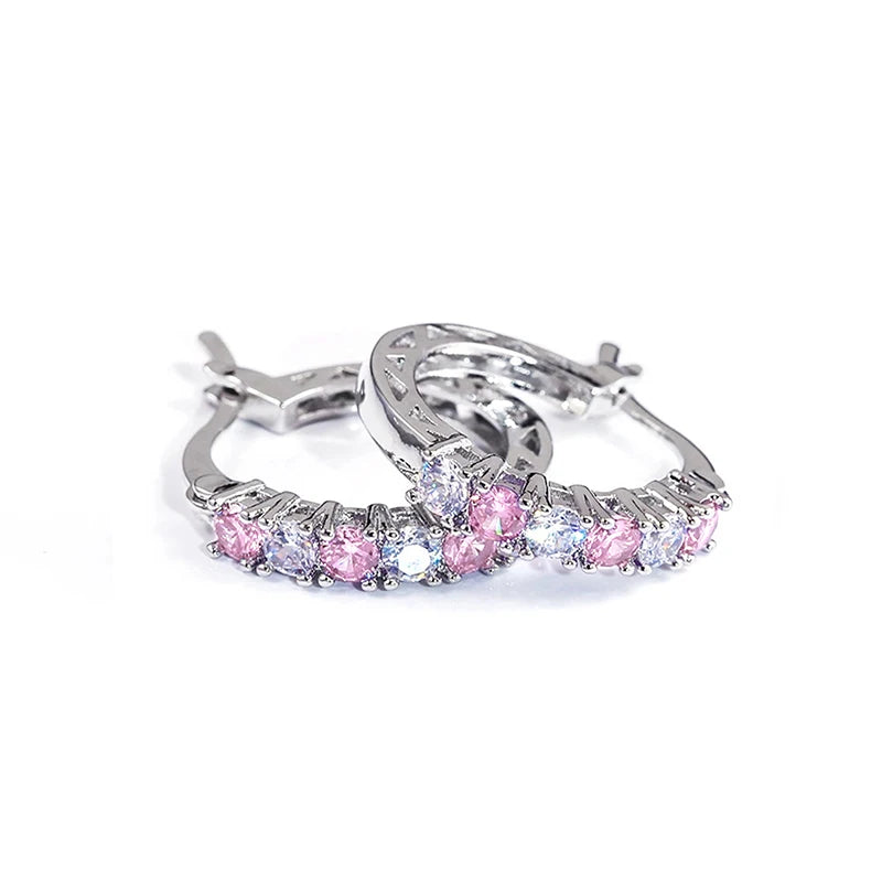 Silver circle hoop earrings with pink and purple gemstones and clear stones