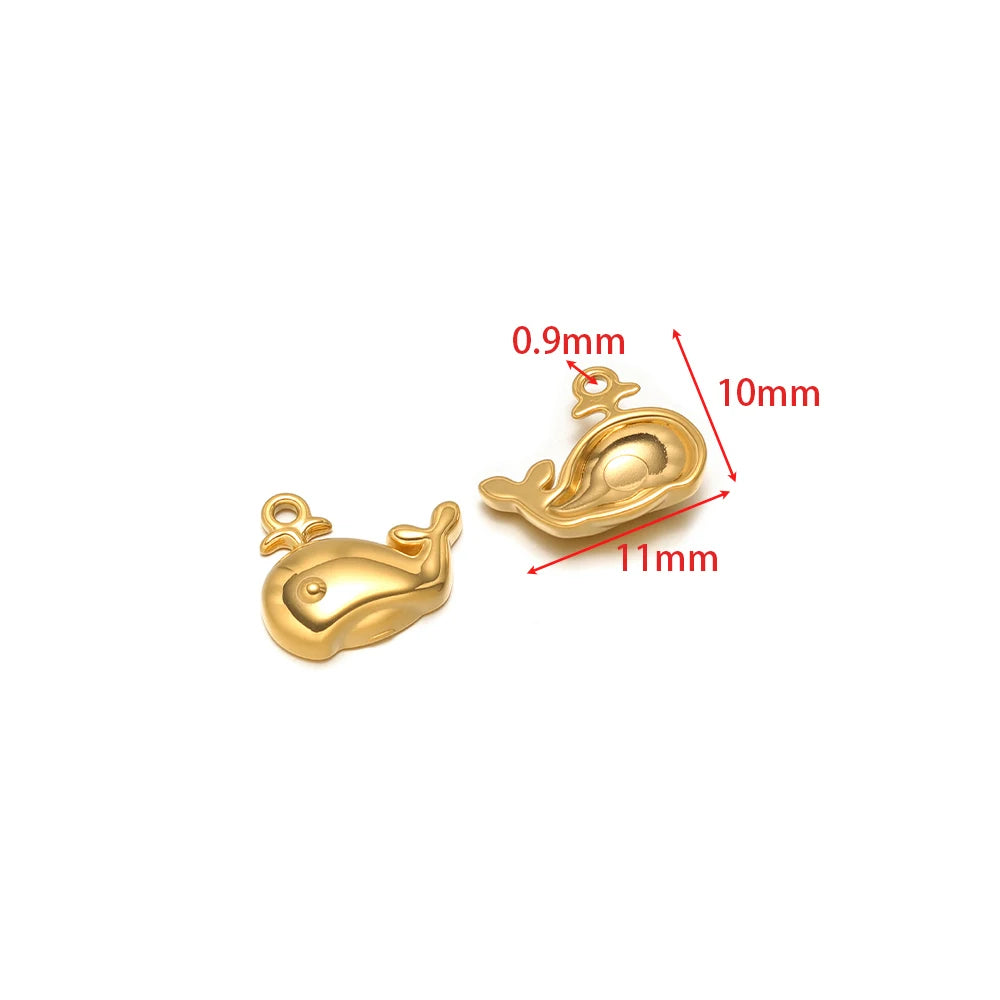 Small gold-tone dolphin charm with connector loop