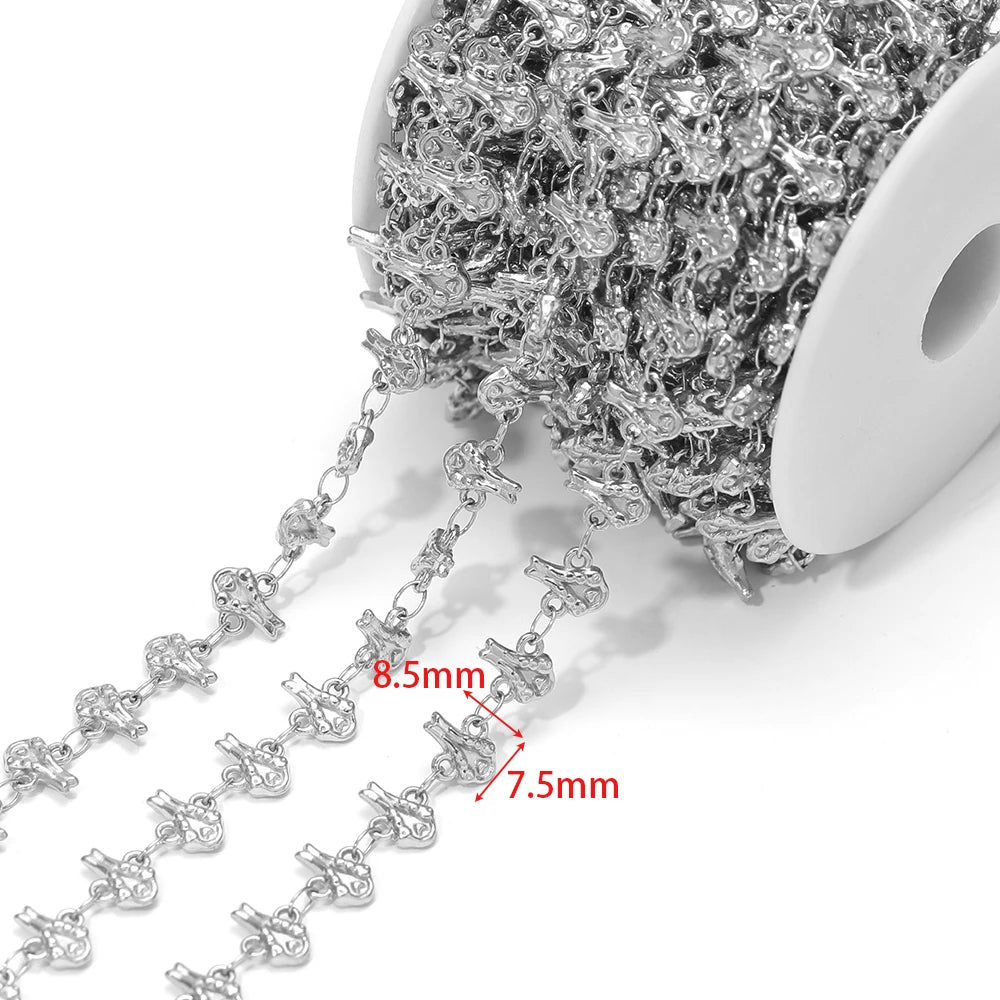 Silver starfish charm chain detail; charm size 8.5mm and 7.5mm
