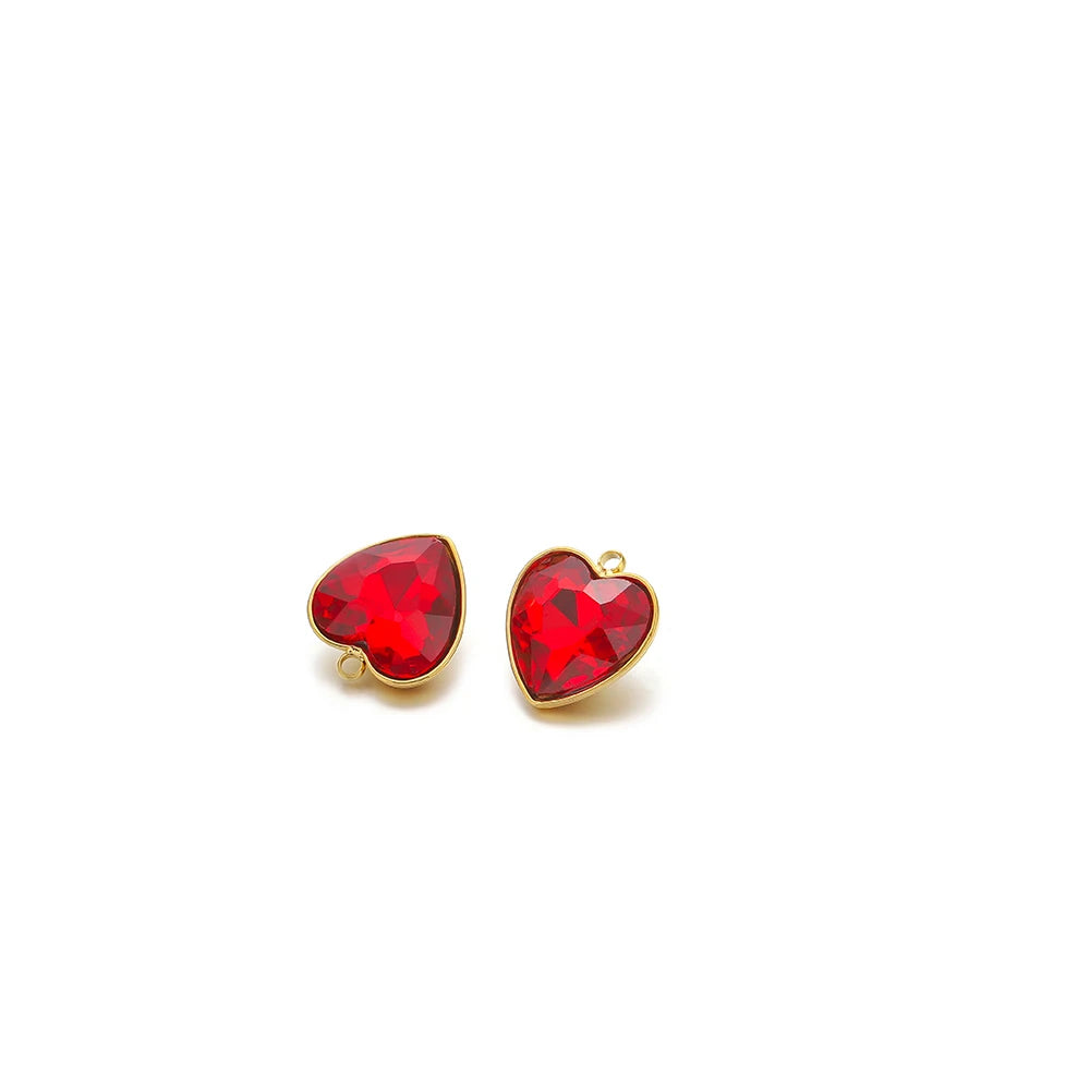 Heart crystal charm pendants, gold-tone with red heart stones, pair
