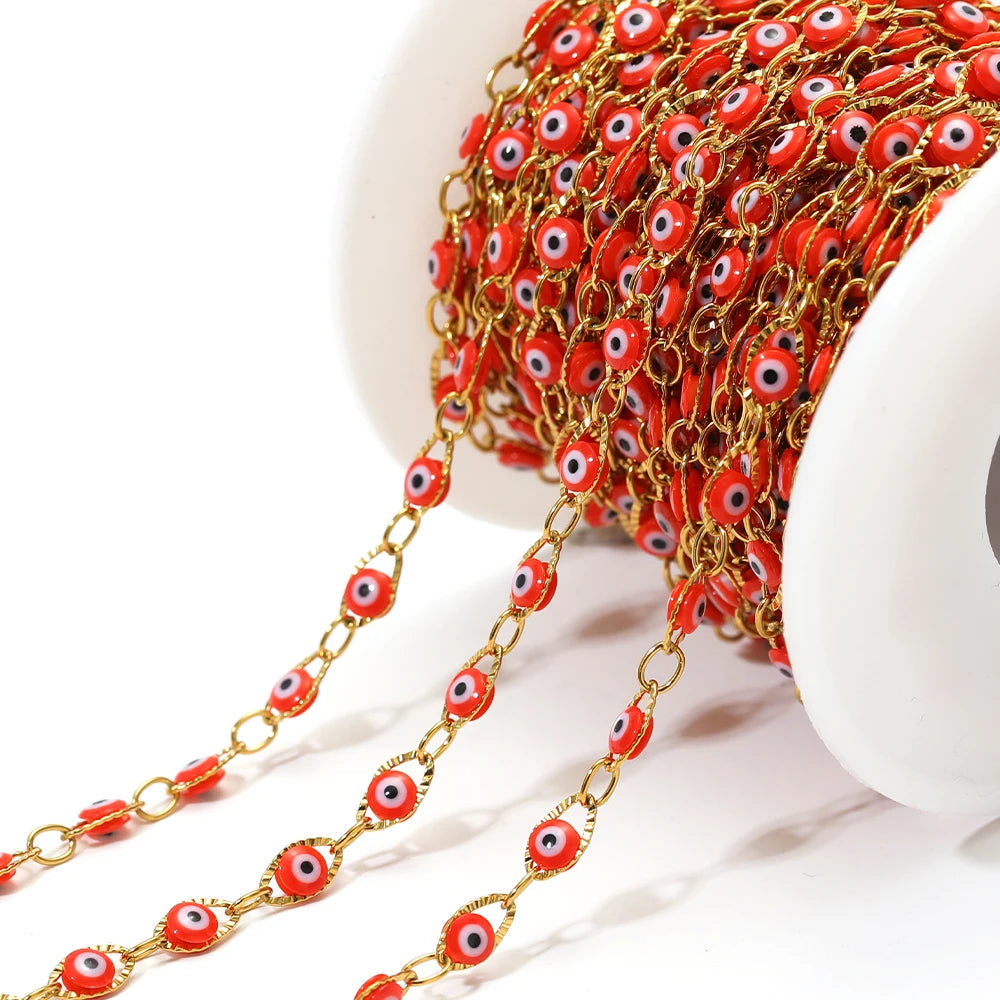 Evil eye bead chain with gold links and red eye charms with white centers