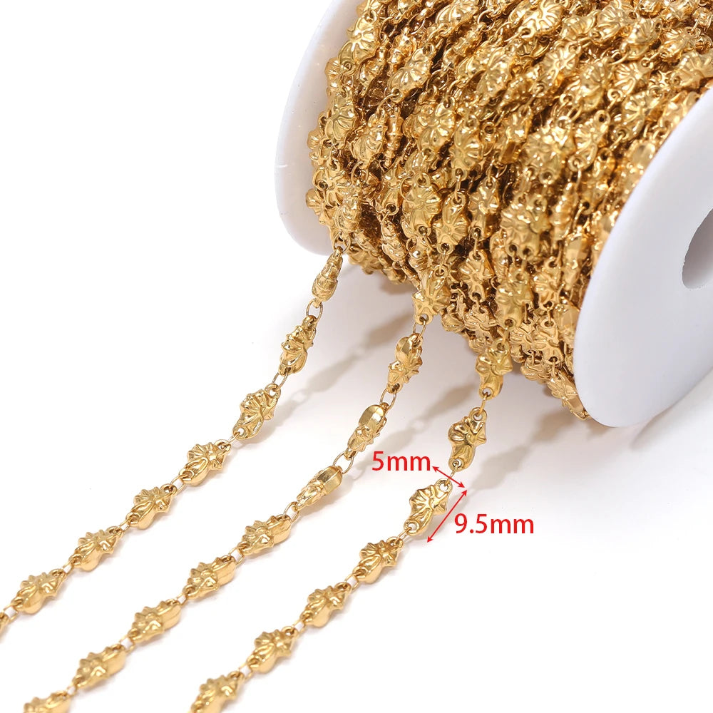 Gold-tone starfish charm chain with oval links, approx 5mm and 9.5mm spacing