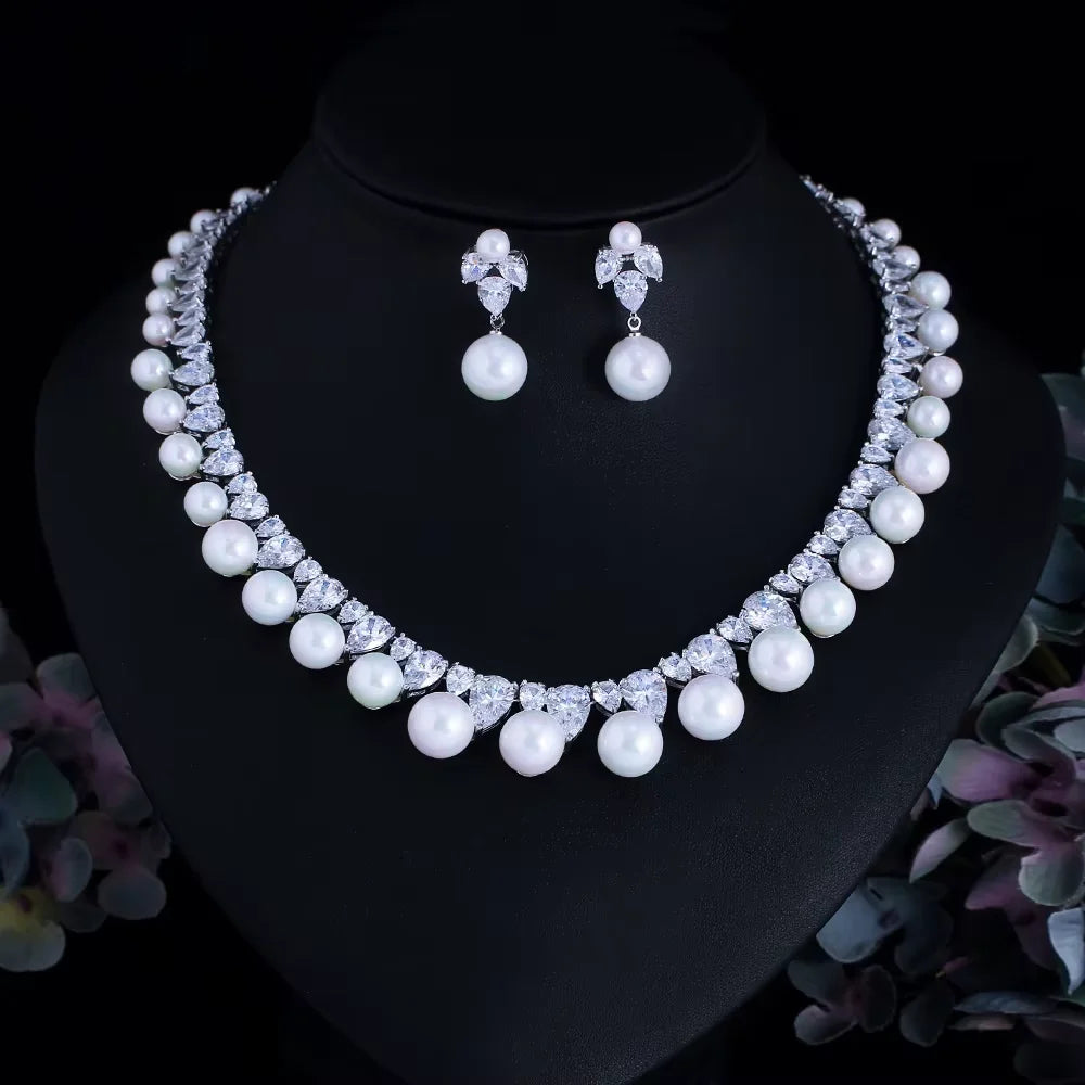 Pearl rhinestone choker necklace with matching drop earrings, silver-tone on mannequin