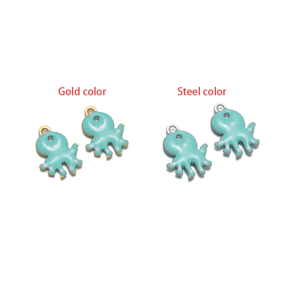Light blue dolphin pendant charm with gold-tone loop, marine animal jewelry finding