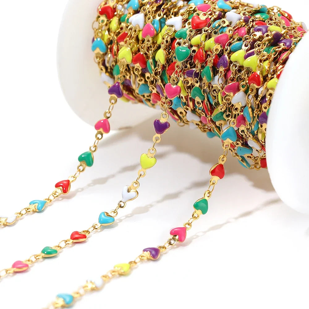 Gold-tone heart link chain with multicolor enamel heart charms and small links