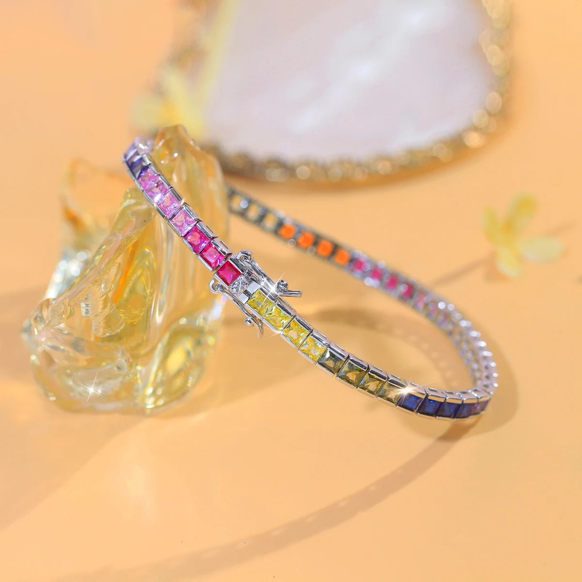 Rainbow square-cut zirconia tennis bracelet showing the clasp and flexible links