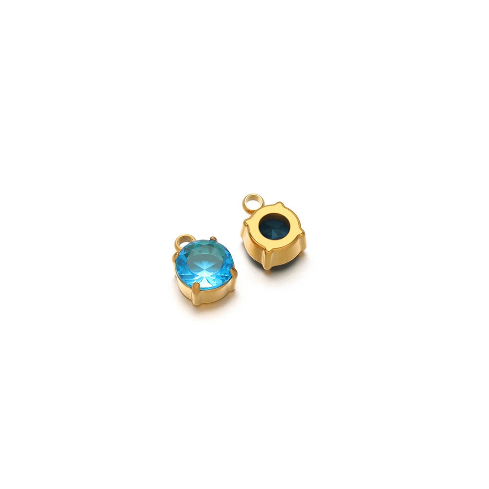 Gold claw sewing rhinestone settings with round light blue crystal
