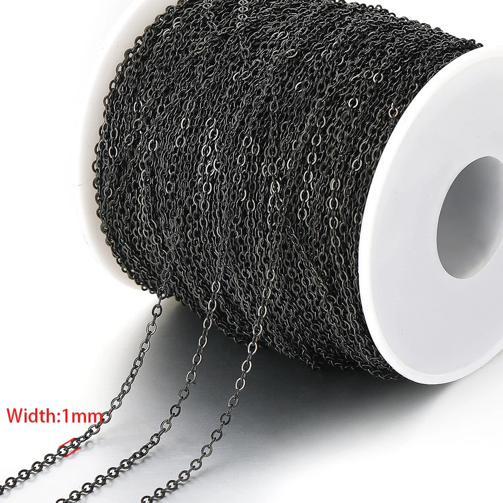 Black stainless steel chain links on a spool, 1mm width with dangling segments