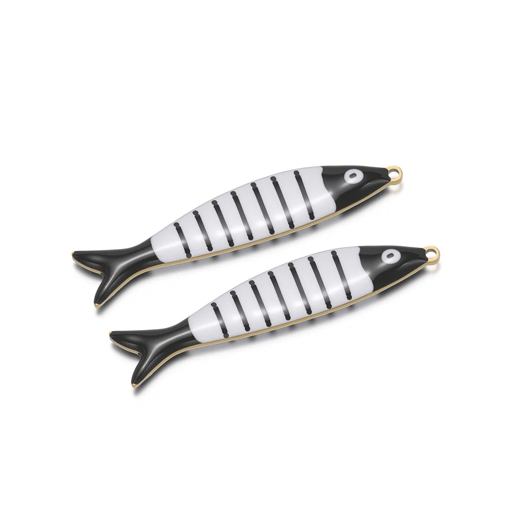 Fish-shaped pendant charm, black tail, white with black stripes and gold loop