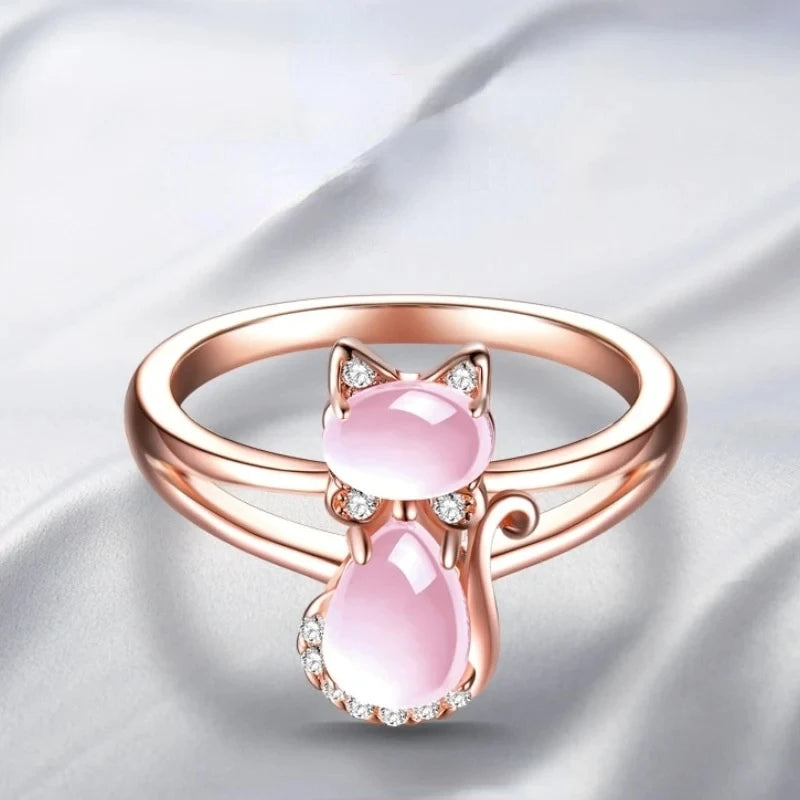 Pink cat ring with rose gold band and two pink stones