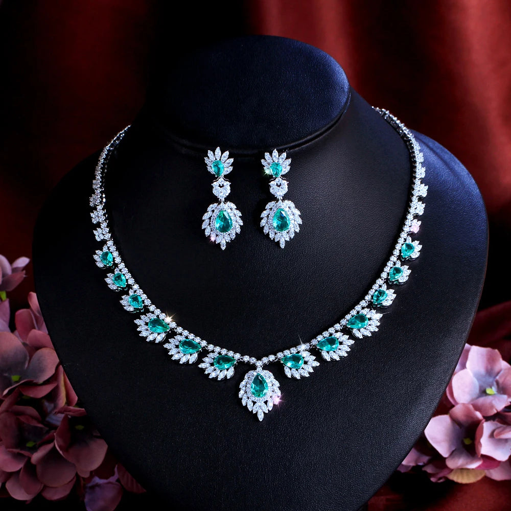 Green CZ necklace and drop earrings set with teardrop floral design