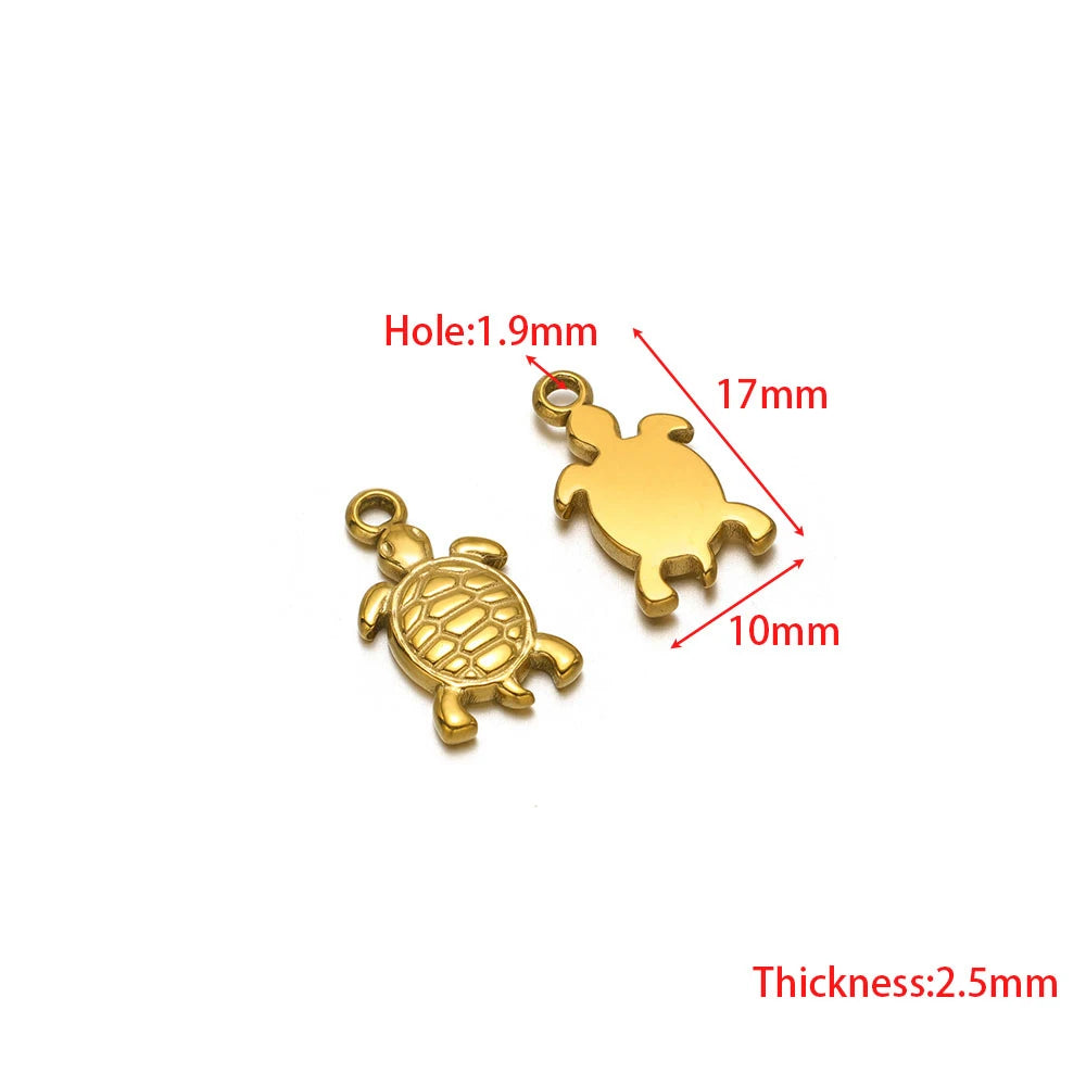 Stainless steel turtle and cat charms with jump ring holes, gold-tone pair