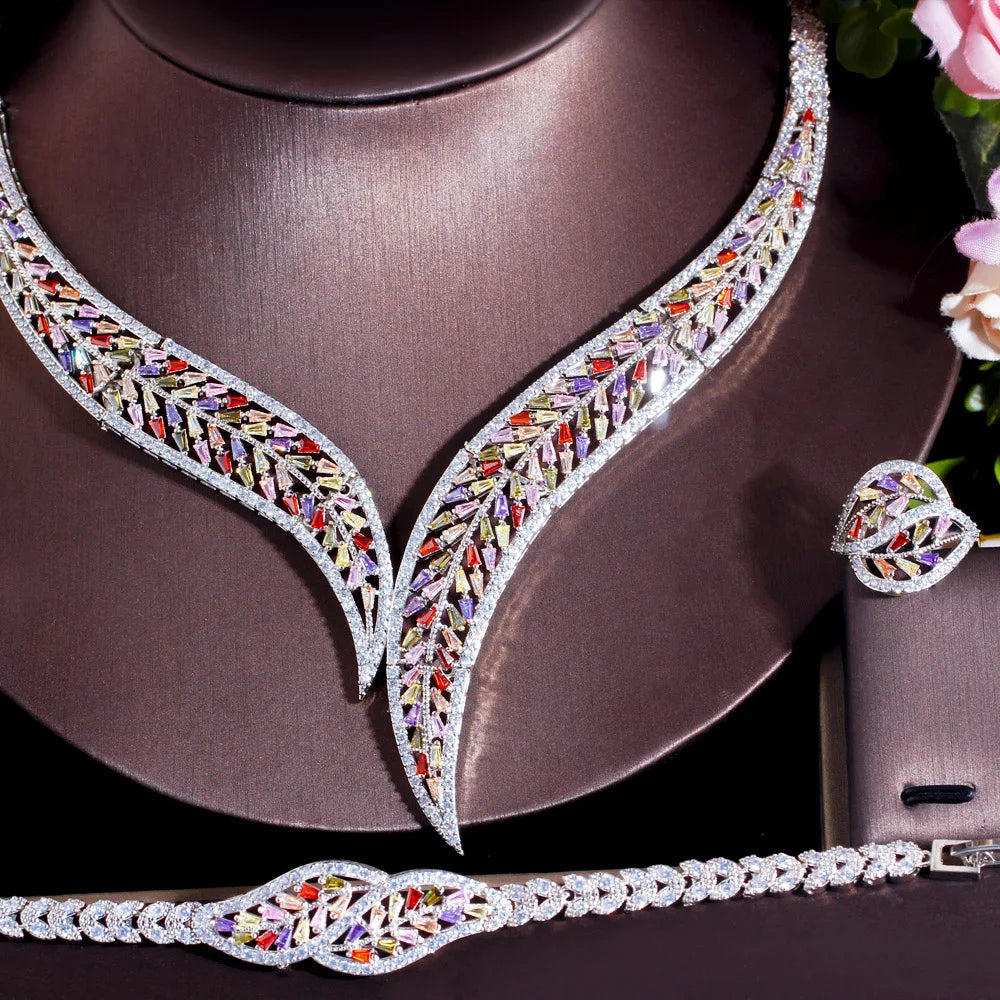 Close-up of multicolor CZ leaf necklace centerpiece and coordinating adjustable ring