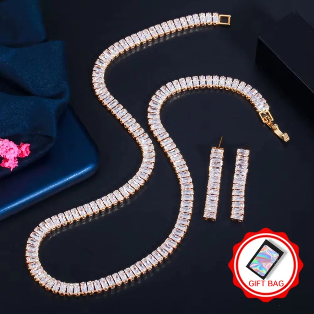 Gold-tone rectangular stone necklace and matching drop earrings, with gift bag offer badge